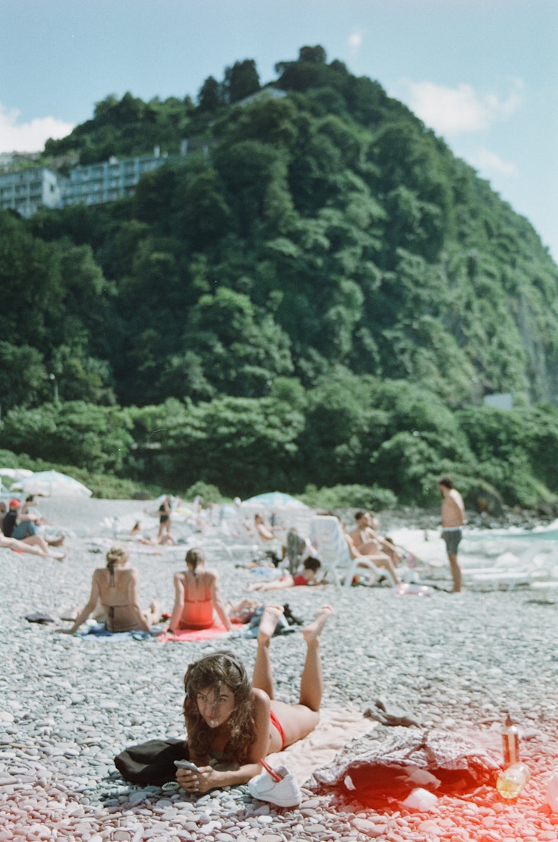 a group of people on a beach